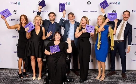 Image of awards winners with trophies