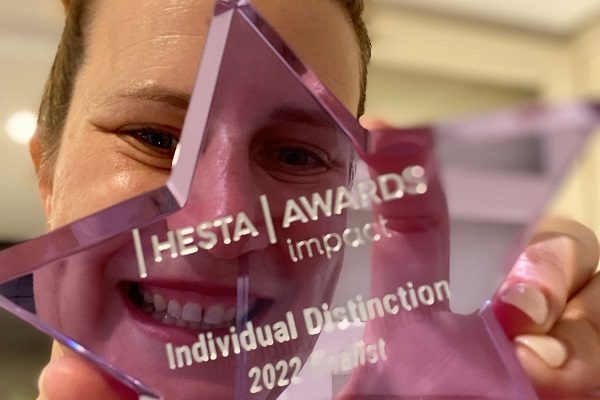 Image of finalist holding trophy