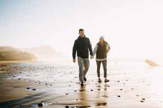 Couple walking on the beach