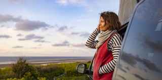 Image of woman looking out at a landscape